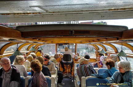 Our canal boat squeezing under a bridge